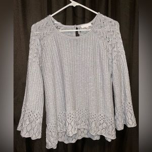 Grey sweater with flared sleeves